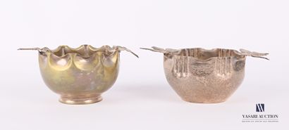 null Two bowls in embossed metal, one with a decoration of two butterflies on the...
