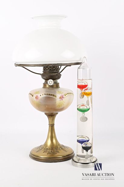 null Lot including a brass oil lamp, the shaft presents a glass sphere decorated...