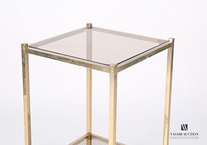 null Square-shaped sofa in gilded metal, it presents two trays in smoked glass supported...