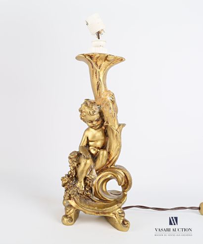 null Pair of lamp bases in carved and gilded resin, the shaft showing young children...