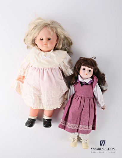 null Lot including a porcelain doll with head, hands and calves, wearing a purple...