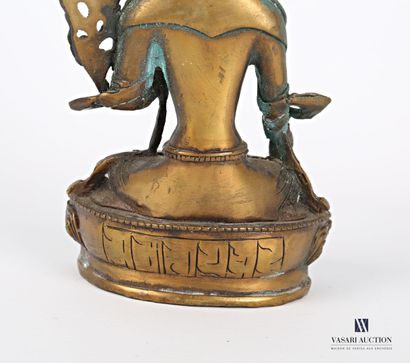 null TIBET

Sujet en bronze représentant Tara assis sur un socle aux godrons

(usures...