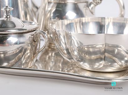 null Tea and coffee set in silver plated metal comprising a rectangular tray with...