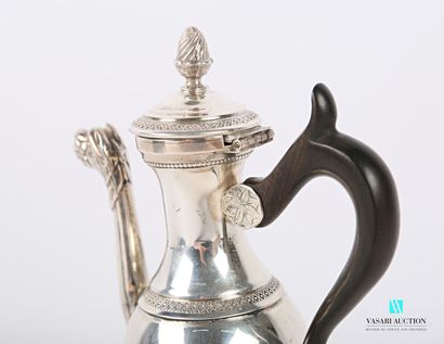 null Selfish silver jug standing on three arched legs ended by lion claws and topped...