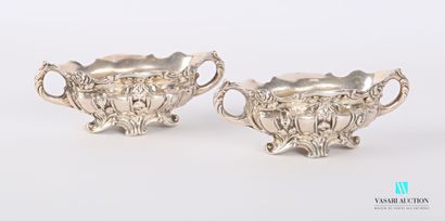 null Pair of silver saltcellars in the form of oblong basins standing on four scrolled...