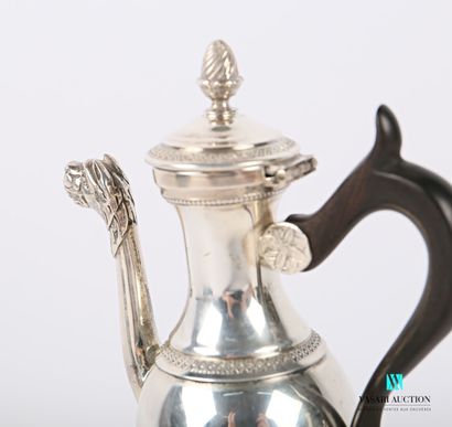 null Selfish silver jug standing on three arched legs ended by lion claws and topped...