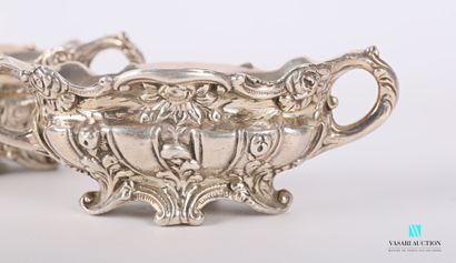 null Pair of silver saltcellars in the form of oblong basins standing on four scrolled...