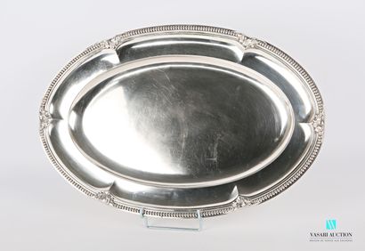 null Oblong silver dish, the border hemmed with a frieze of pearls decorated with...