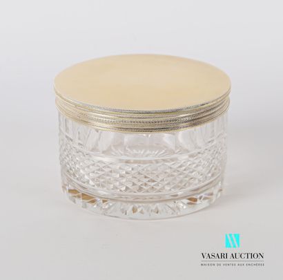 Round crystal box decorated with a frieze...