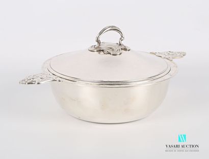null Silver-plated metal legume dish of round form posing on a flat bottom, the plain...
