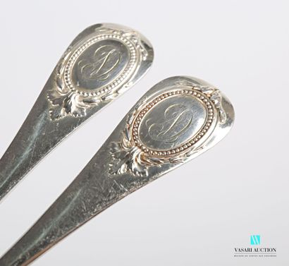null Part of a silver-plated 25-piece menagère, the handle decorated with a medallion...
