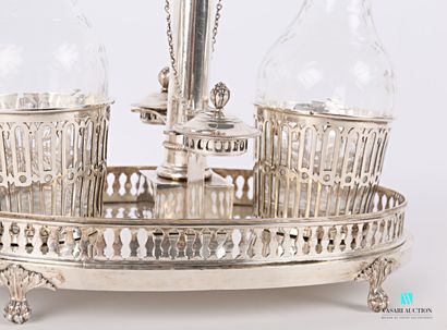 null Oil cruet in silver, the basin of oval form posing on four feet claws of lion...