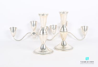null Pair of candelabras with three lights which can form end of table or candlestick...