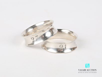 null Pair of napkin rings in silver plated metal, the concave body engraved with...