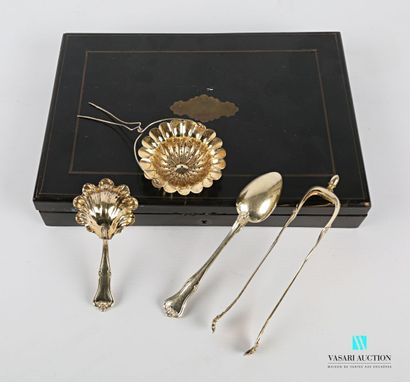 null Tea set in silver gilt 800 thousandths including twelve spoons, a sugar tongs,...