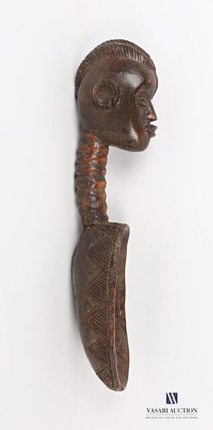 null IVORY COAST

Ceremonial spoon in carved wood, the oval spoon decorated with...