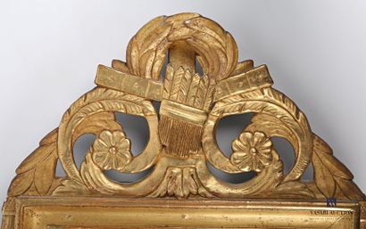 null Wood and gilded stucco mirror with a rectangular view, it is surmounted by a...