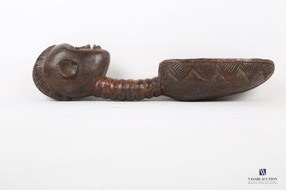 null IVORY COAST

Ceremonial spoon in carved wood, the oval spoon decorated with...