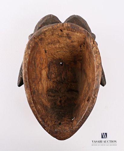 null PUNU - GABON

Masque fémin blanc en bois sculpté patiné et pigmenté, la coiffe...