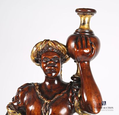 null Nubian torchbearer in carved wood and varnished with double patina

20th century

Height...