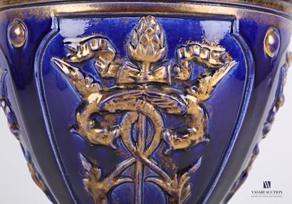 null Vase of baluster form out of earthenware tinted blue night and raised of gold,...