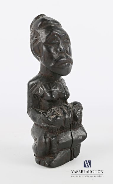 null Statuette in ebony representing a maternity.

Probably Congo 

(crack and slight...