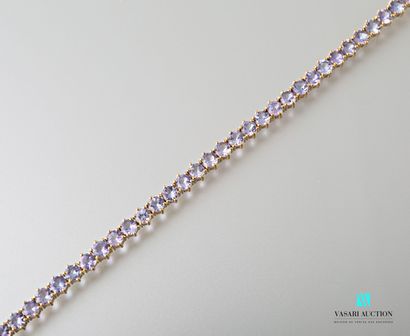 null Flexible bracelet in vermeil 925 thousandths set with facetted round tanzanites...
