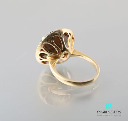 null Ring in vermeil 925 thousandths set with a round faceted smoked quartz surrounded...