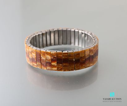 null Steel bracelet covered with resin sticks imitating the sun stone 

Diameter...