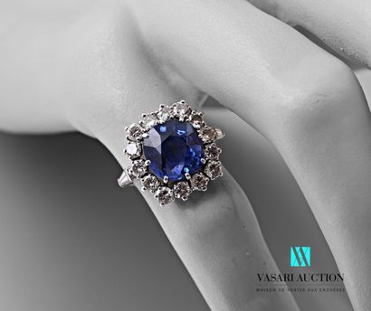 null Ring in white gold 750 thousandth set with a cushion-cut sapphire of about 6.3...