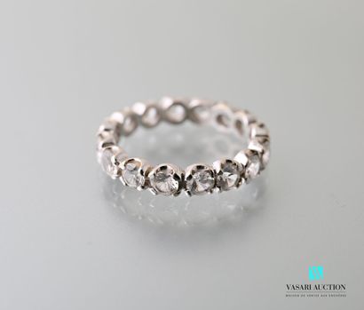 null Wedding ring in white gold 750 thousandth set with sixteen white stones of imitation...