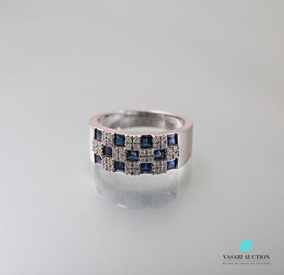 null Band ring in white gold 750 thousandths with checkerboard pattern set with sapphires...