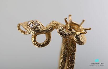 null Snake ring mounting in yellow gold 750 thousandth chased with double revolution,...
