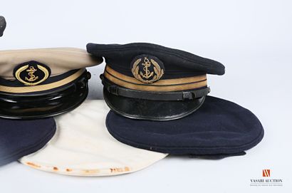 null First class ensign's cap, a second class ensign's summer cap is attached, a...