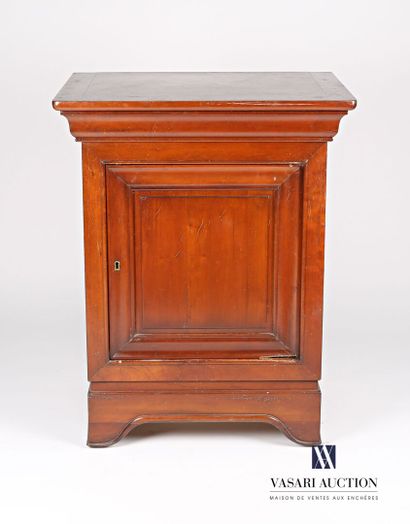 null Jam cupboard in moulded cherry wood, it opens in front of a drawer in belt and...