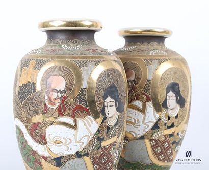 null JAPAN 

Pair of earthenware vases of ovoid form with a Satsuma decoration of...