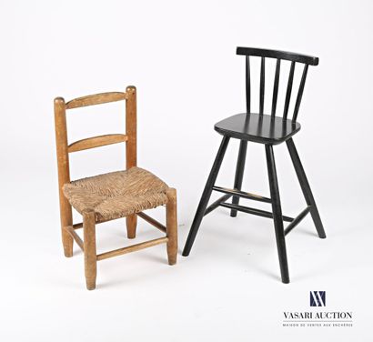 null Lot including a child's chair in black lacquered wood, the back slightly curved...