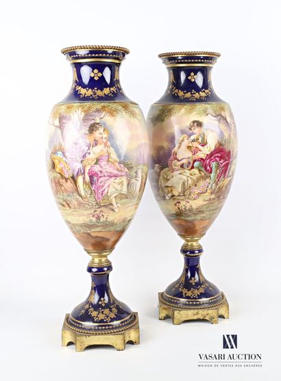 null Pair of sealed porcelain vases of baluster form with polychrome decoration of...