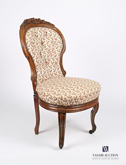 null Molded and carved oak chair, the balloon back upholstered and topped with fruit...