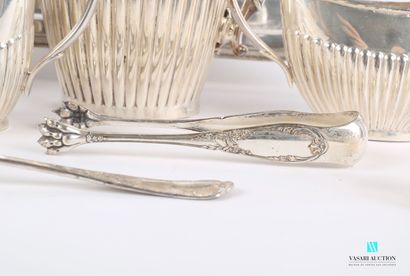 null Lot in silver plated metal including a tea service with decoration of godrons...