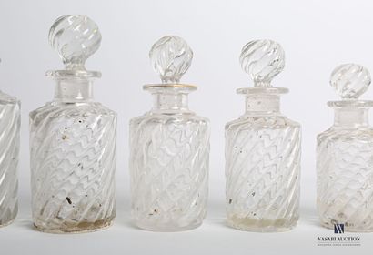 null Moulded crystal toiletry set, the body decorated with helicoidal stripes of...