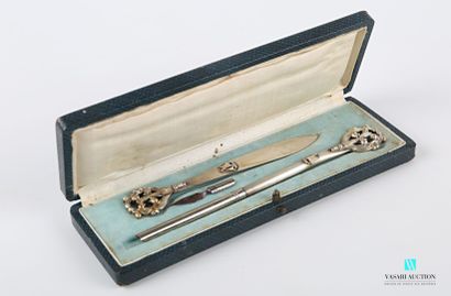 Metal writing set in a case including a letter...