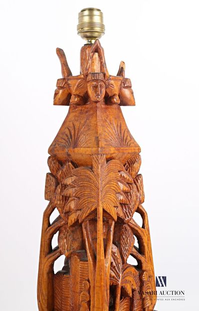 null Lot including, a carved wooden subject representing an anthropomorphic being...