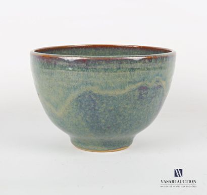 null Bowl in glazed stoneware the iridescent enamel, the border hemmed with nets....