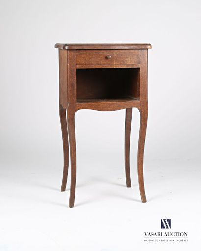  Bedside table in natural wood, the tray moved in front, it opens by a drawer in...