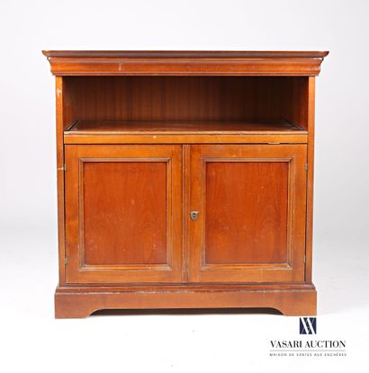 null Moulded cherry wood TV cabinet, it presents a niche in front of a sliding tray...