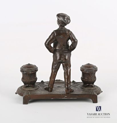 null Inkwell with two windows in regula showing a young man with his hands on his...