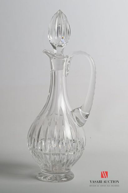 null Carafe of baluster form out of cut crystal with decoration of stings, the neck...