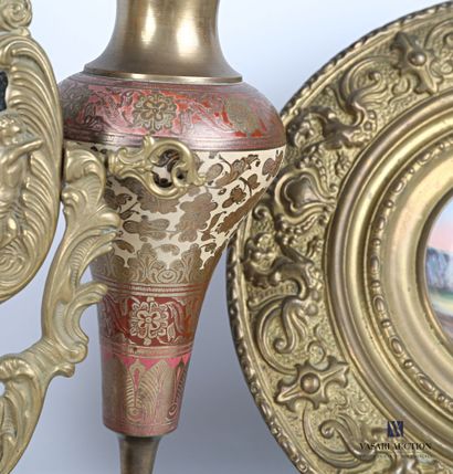 null Lot including a bronze psyche mirror, the mirror hemmed with a decoration of...