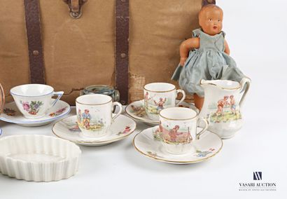null Doll furniture including two tea sets, one decorated with flowers and the other...